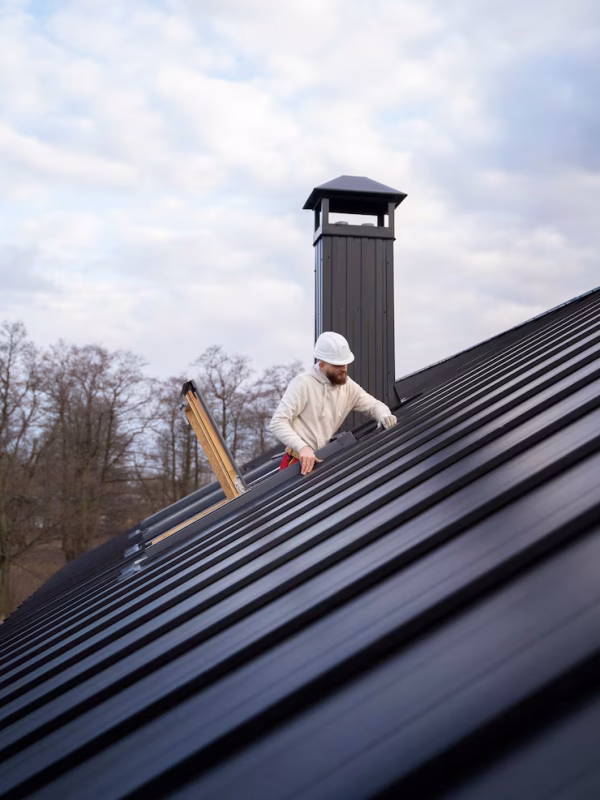 full-shot-man-working-roof_23-2149343702